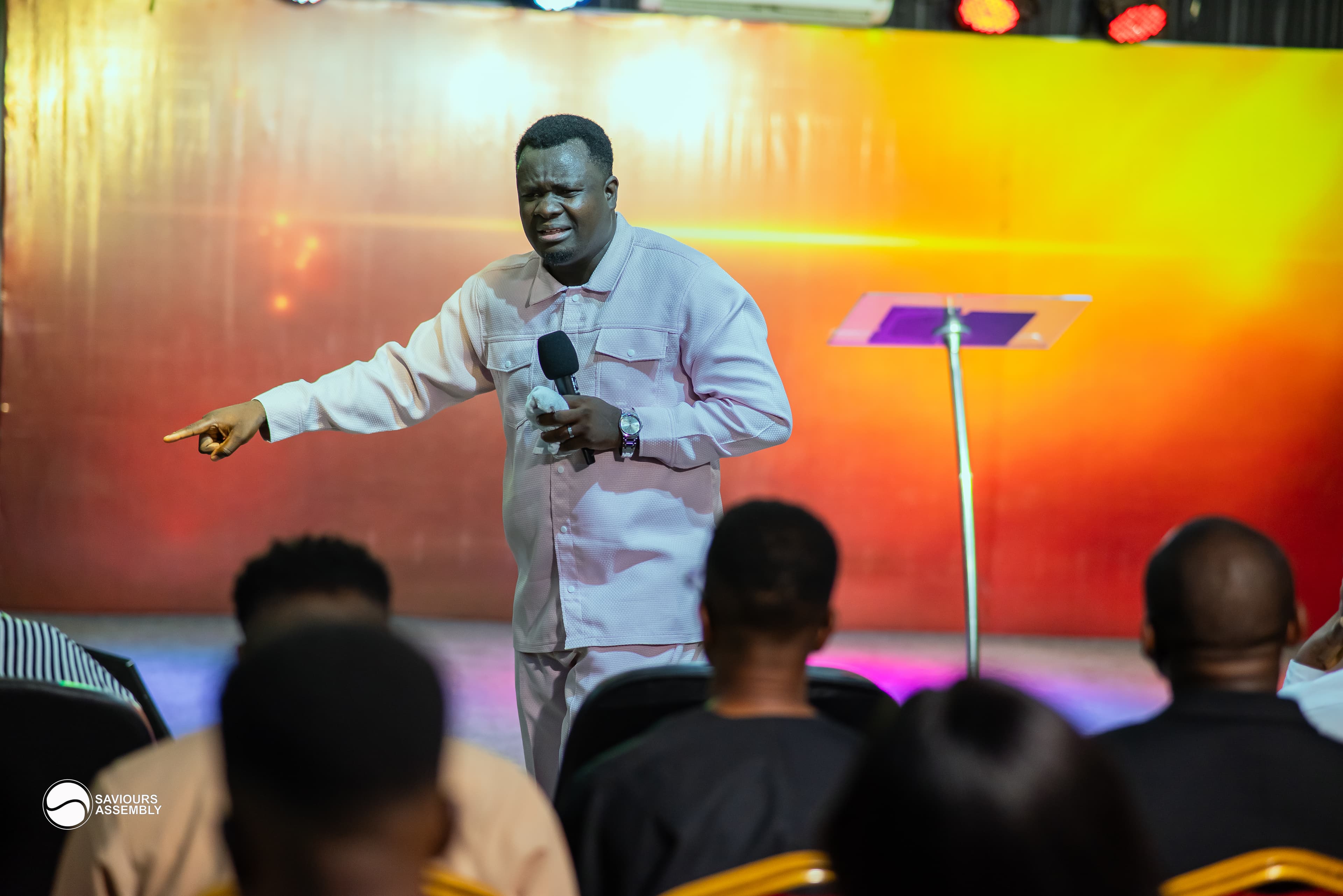 Pastor Henry Odewale in a moment of prayer and reflection