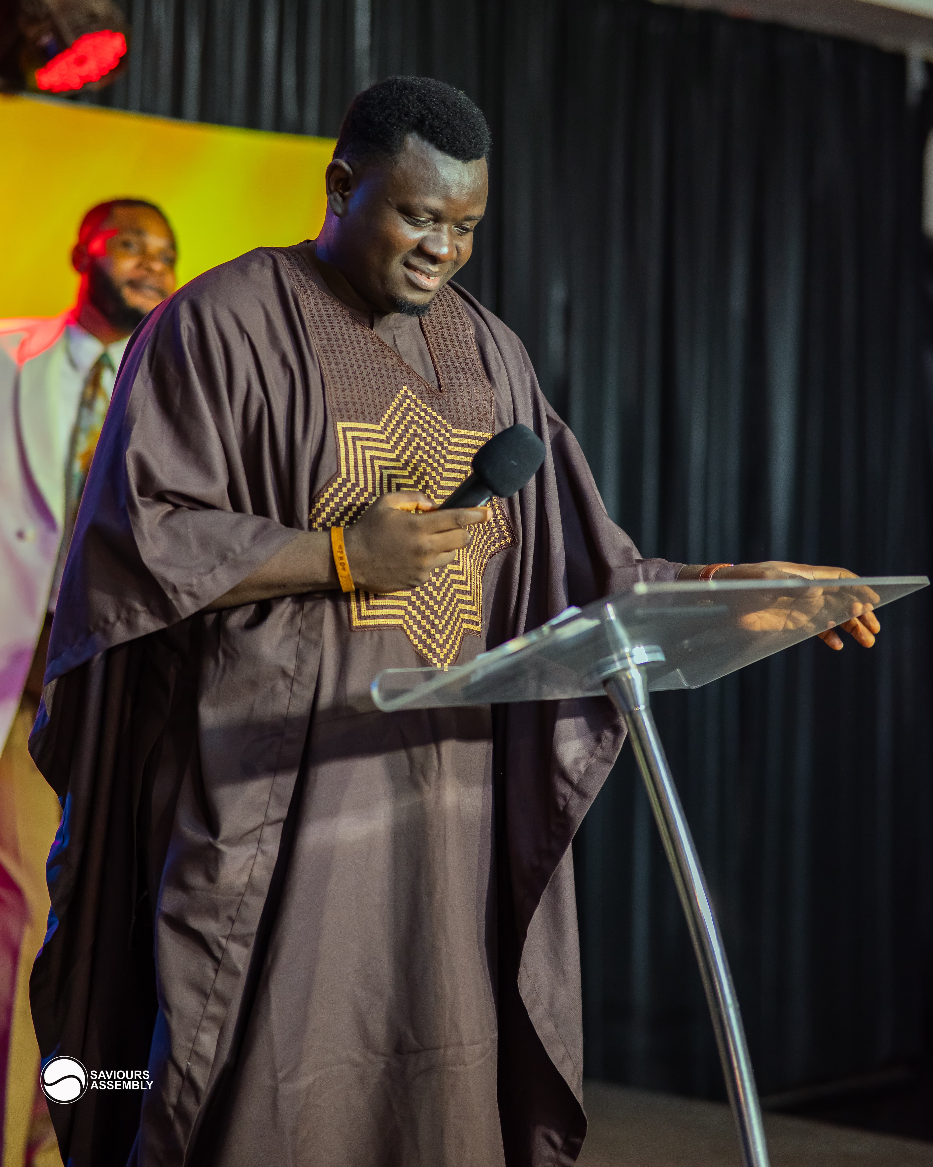 Pastor Henry Odewale with the church family during a ministry gathering